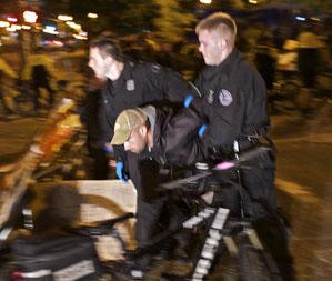 Police arresting Occupy Portland protester